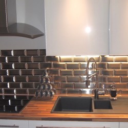 Modern kitchen backsplash installed using the Metro Acier Kitchen Wall Tile