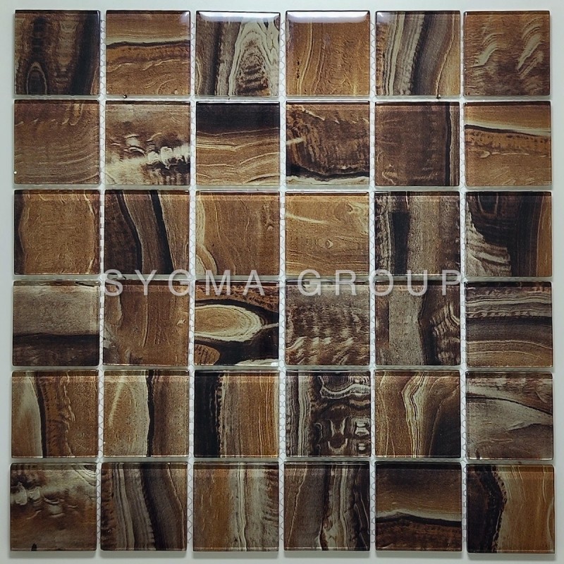Sheet of Sonny wood look wall tile in a glass mosaic pattern.